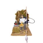 Pescatore seduto serie 10 cm in movimento N30/MV024