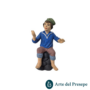 Uomo con cappello seduto su rocce in Terracotta da 7cm 134/26