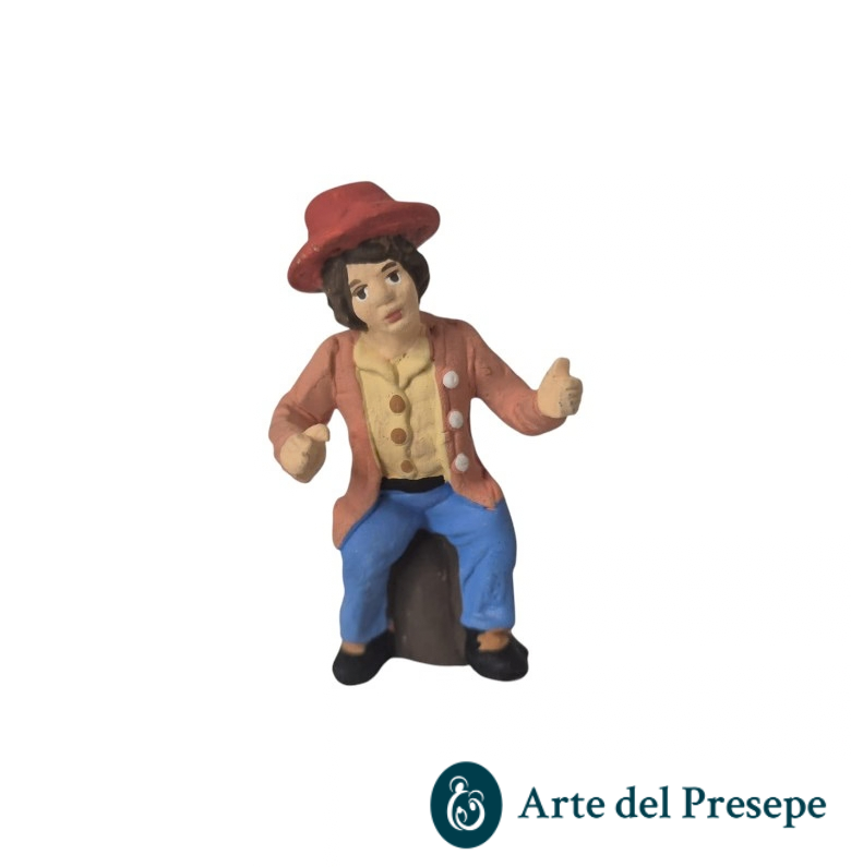Uomo seduto su tronco in Terracotta da 7cm 219/26